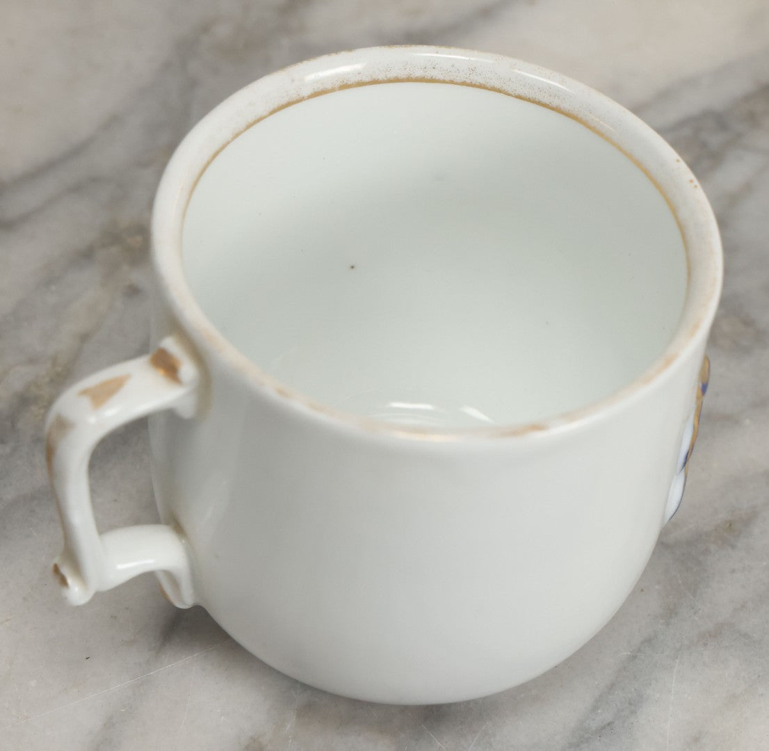 Lot 130 - Antique Porcelain Mug With Blue And Gold "Present" Decoration, Makers Mark On Bottom