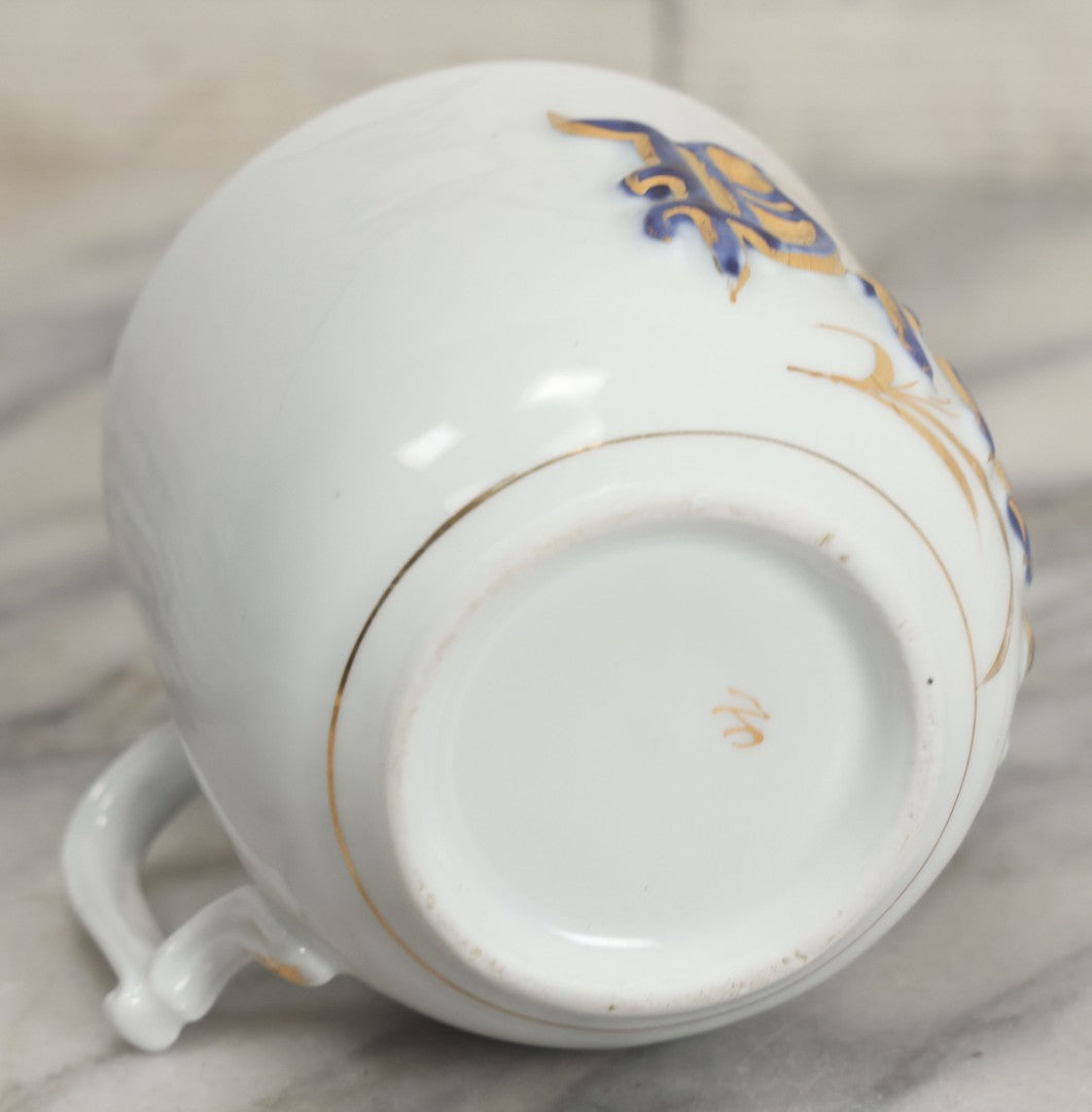 Lot 130 - Antique Porcelain Mug With Blue And Gold "Present" Decoration, Makers Mark On Bottom
