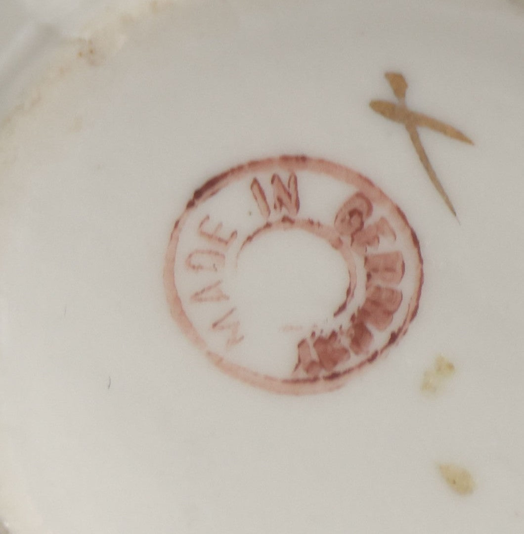 Lot 131 - Antique Porcelain Mug With Pink And Gold "Present" Decoration, Bottom Marked Made In Germany