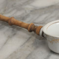 Lot 132 - Vintage Porcelain Tea Strainer With Gold Painted Details And Wire Attached Wooden Handle, Note Repairs