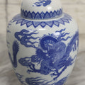 Lot 134 - Vintage Blue And White Porcelain Chinese Dragon Decorated Ginger Jar With Lid