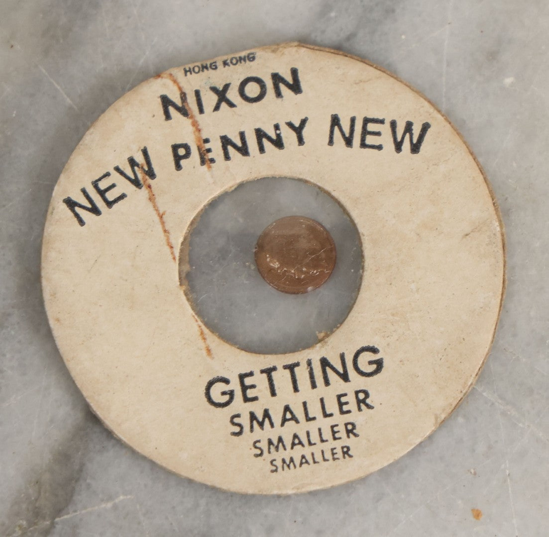 Lot 165 - Eight Piece Vintage Smalls Grouping Including Hoyt's Dime Cologne Bottle, Nixon New Penny Novelty, Ebony And Metal Crucifix, And Other Items