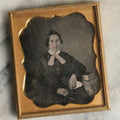 Lot 065 - Antique 1/6th Plate Daguerreotype Photograph Of Woman Wearing Gold Tinted Jewelry Sitting Beside Table With Book, No Case.