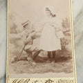 Lot 084 - Antique Cabinet Card Photograph Of Young Boy Courting Young Girl With Handwritten Quote "Will You Marry Me My Pretty Maid", Note On Back "For Lottie Halliday", J.C. Barton, Photographer, Chesley, Ontario