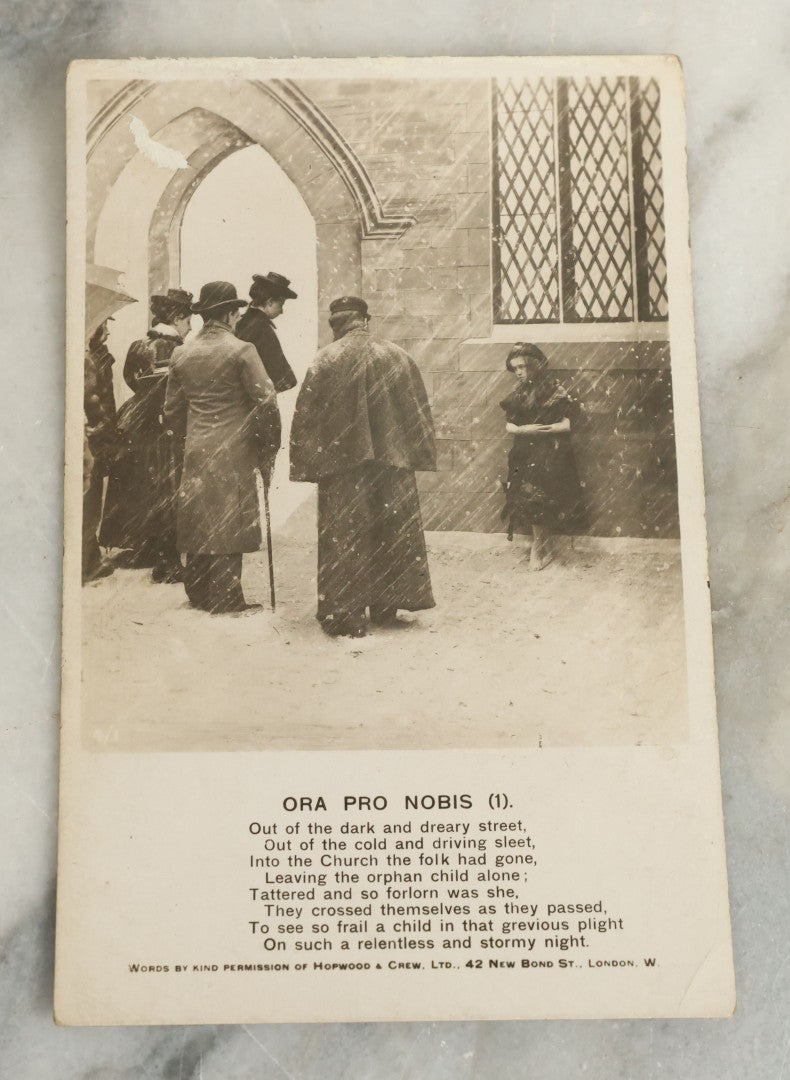 Lot 097 - Grouping Of 35 Antique Photographic Postcards From Bamforth's "Life Model Series," England And New York City, With Many Posed Studio Photographs And Series Including Rock Of Ages, The Little Hero, Excelsior, And Others