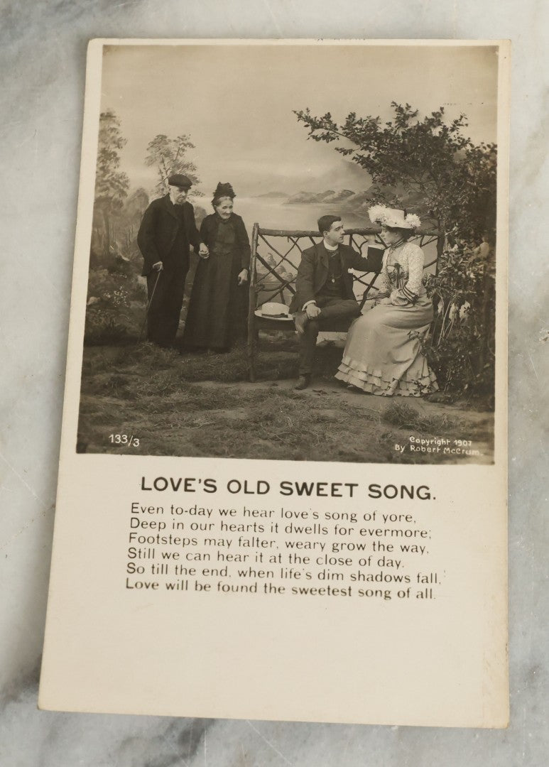 Lot 097 - Grouping Of 35 Antique Photographic Postcards From Bamforth's "Life Model Series," England And New York City, With Many Posed Studio Photographs And Series Including Rock Of Ages, The Little Hero, Excelsior, And Others