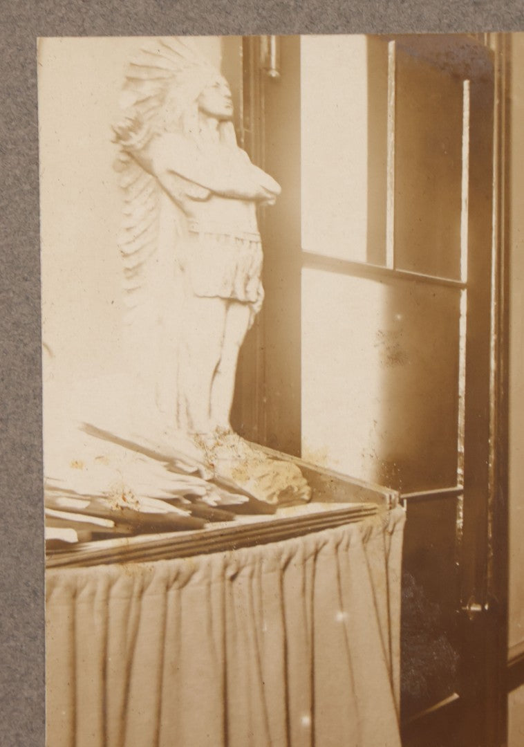 Lot 081 - Antique Boarded Occupational Photograph Of Man In His Office With Map, Sextant, And Telephone Visible In Photo