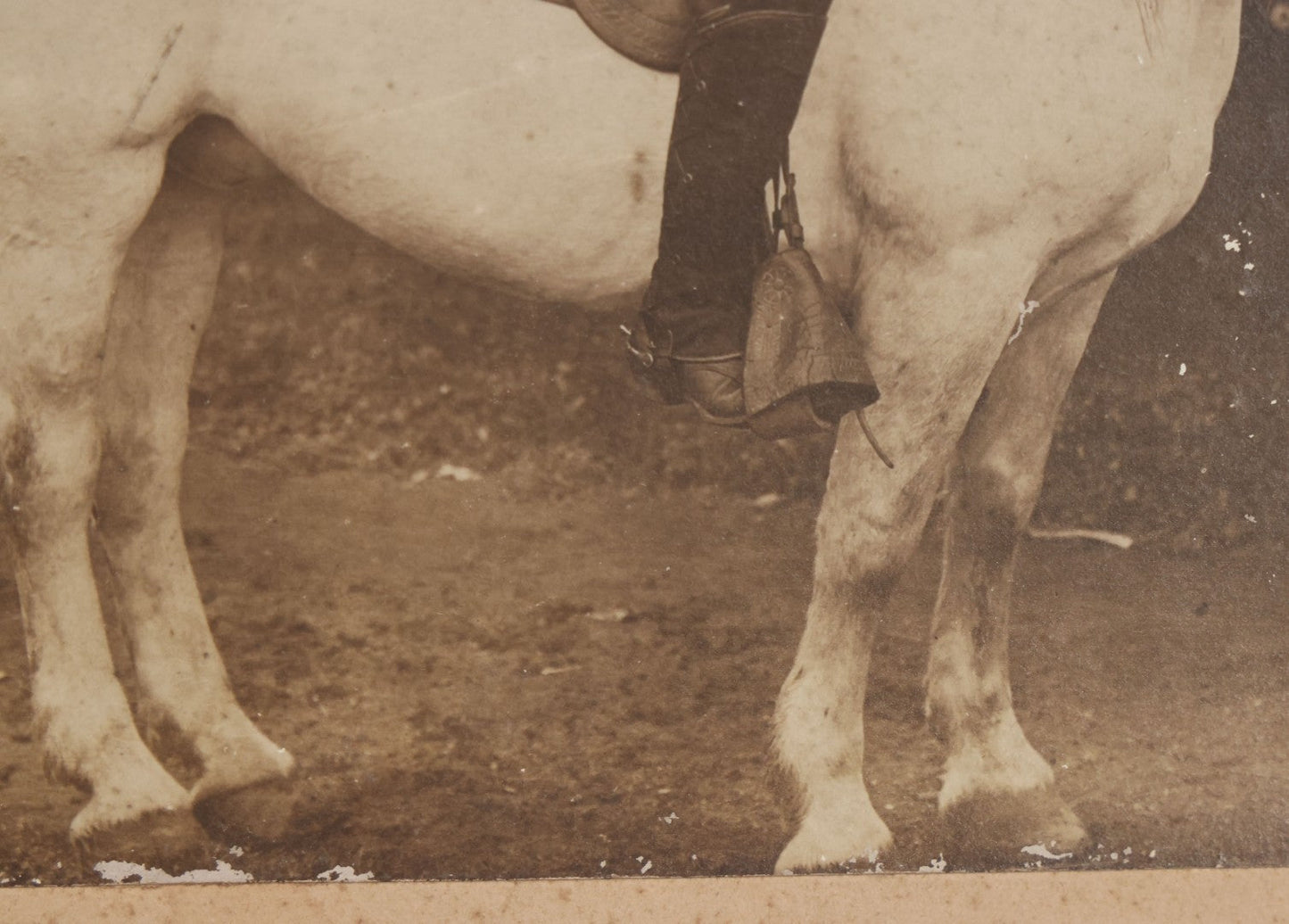 Lot 083 - Antique Boarded Photograph Of Man In Uniform Sitting Horseback On White Horse With Saddle Blanket Emblazoned With Star, Western Hat And Badge