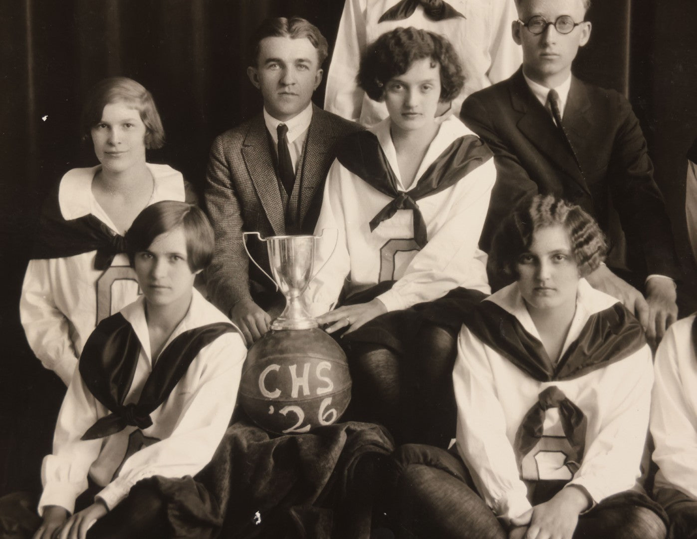 Lot 095 - Vintage Photograph In Paper Frame Of Girls Basketball Team Posing With Coaches, Trophy, And Basketball Marked C.H.S. 1926, Likely Catawissa High School, Phillips, Photographer, Bloomsburg, Eagles-Mere, & Danville, Pennsylvania 