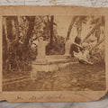 Lot 100 - Antique Boarded Photograph Of Person Sitting At Gravesite Identified As "An Arab Tomb", Partial Photographer Mark And Monogram On Photo Board, Out Of Algeria, Note Losses And Cracking Throughout Photo And Board, Poor Condition