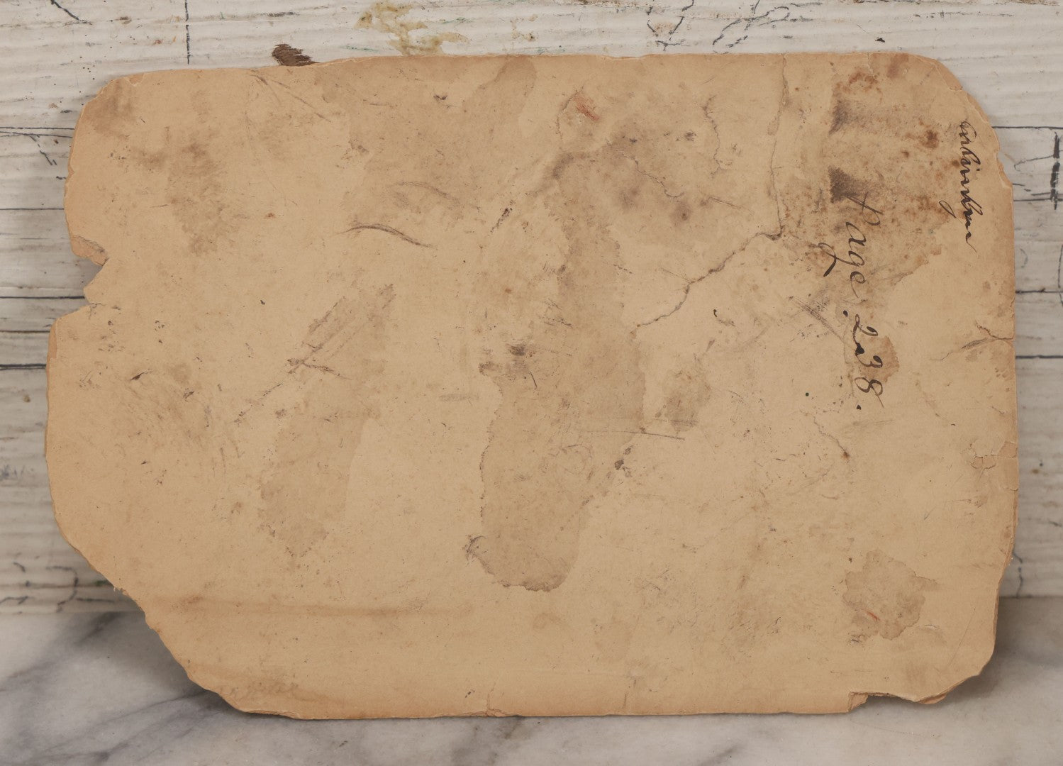 Lot 100 - Antique Boarded Photograph Of Person Sitting At Gravesite Identified As "An Arab Tomb", Partial Photographer Mark And Monogram On Photo Board, Out Of Algeria, Note Losses And Cracking Throughout Photo And Board, Poor Condition