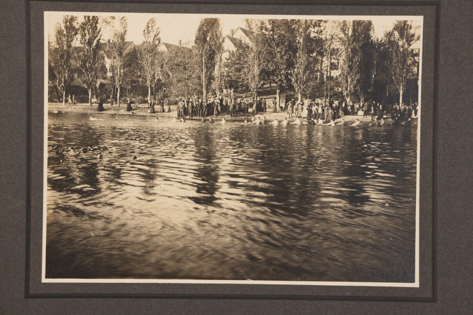 Lot 104 - Antique Boarded Photograph Of Outing On Beach With Many Individuals In A Lake, Possibly Playing Tug Of War