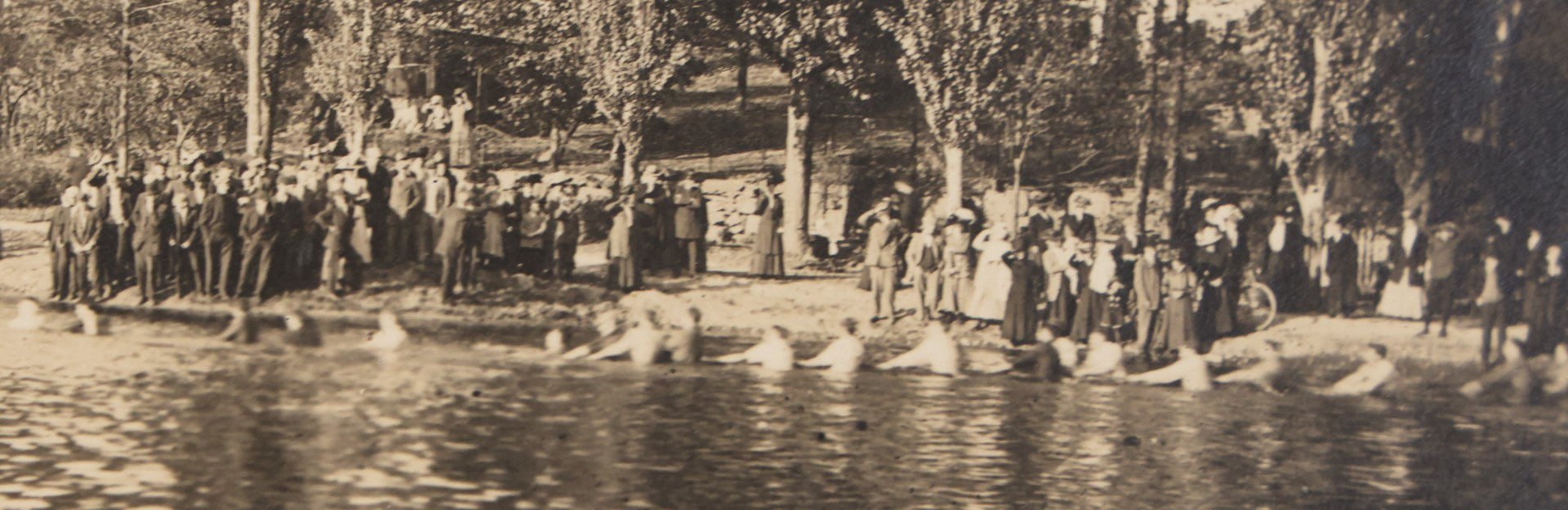 Lot 104 - Antique Boarded Photograph Of Outing On Beach With Many Individuals In A Lake, Possibly Playing Tug Of War