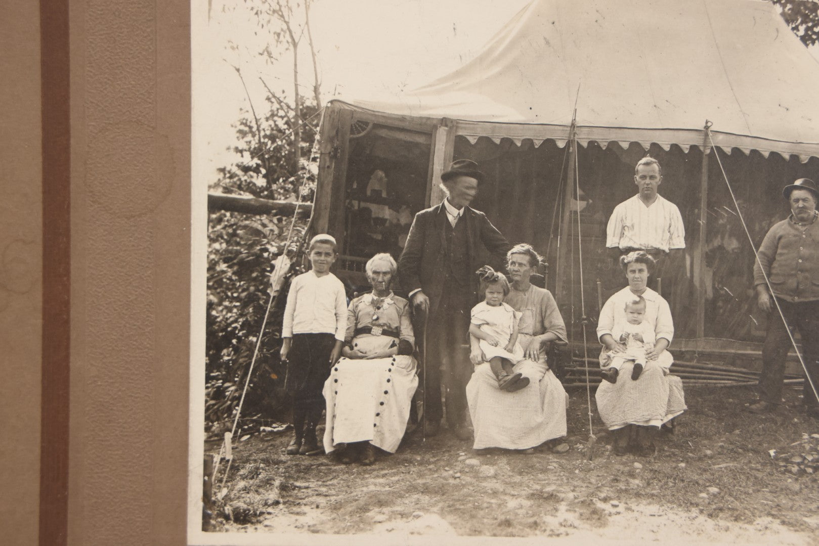 Lot 105 - Antique Boarded Photograph Of Three Generations Of Men Women And Children Posing Outside Of Tent, With Bicycle In Photo