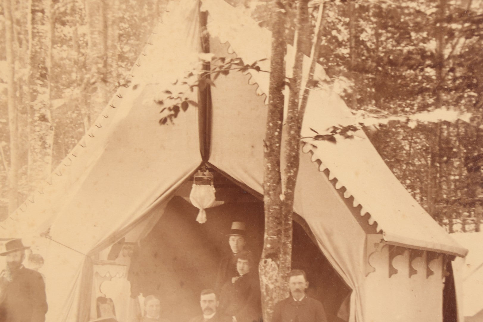 Lot 106 - Antique Boarded Photograph Of Men And Women Posing Outside Tent On Platform In Tent Village