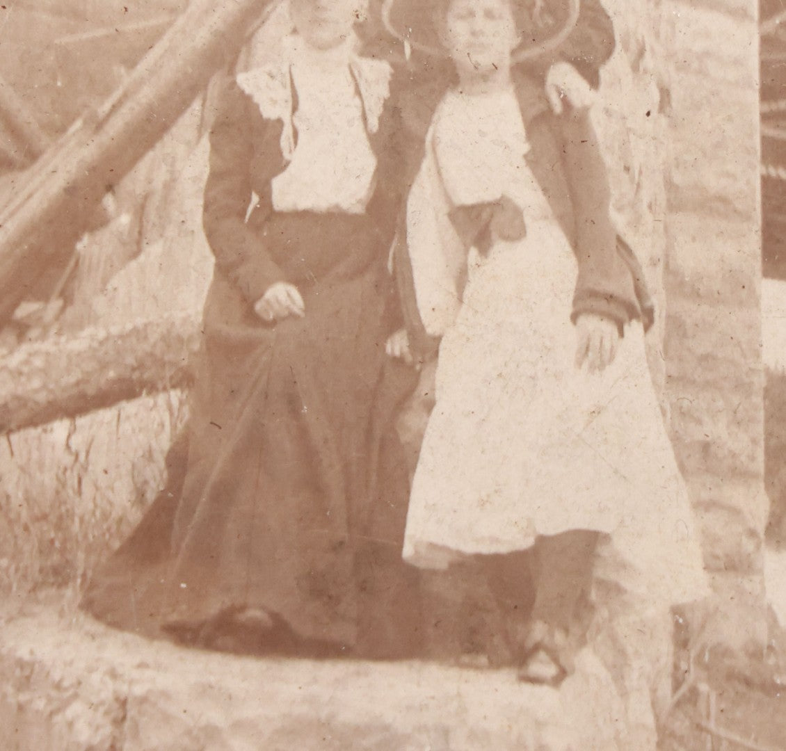Lot 109 - Antique Boarded Photograph Of Two Women And Man Posing Beside Partially Collapsed Railroad Bridge