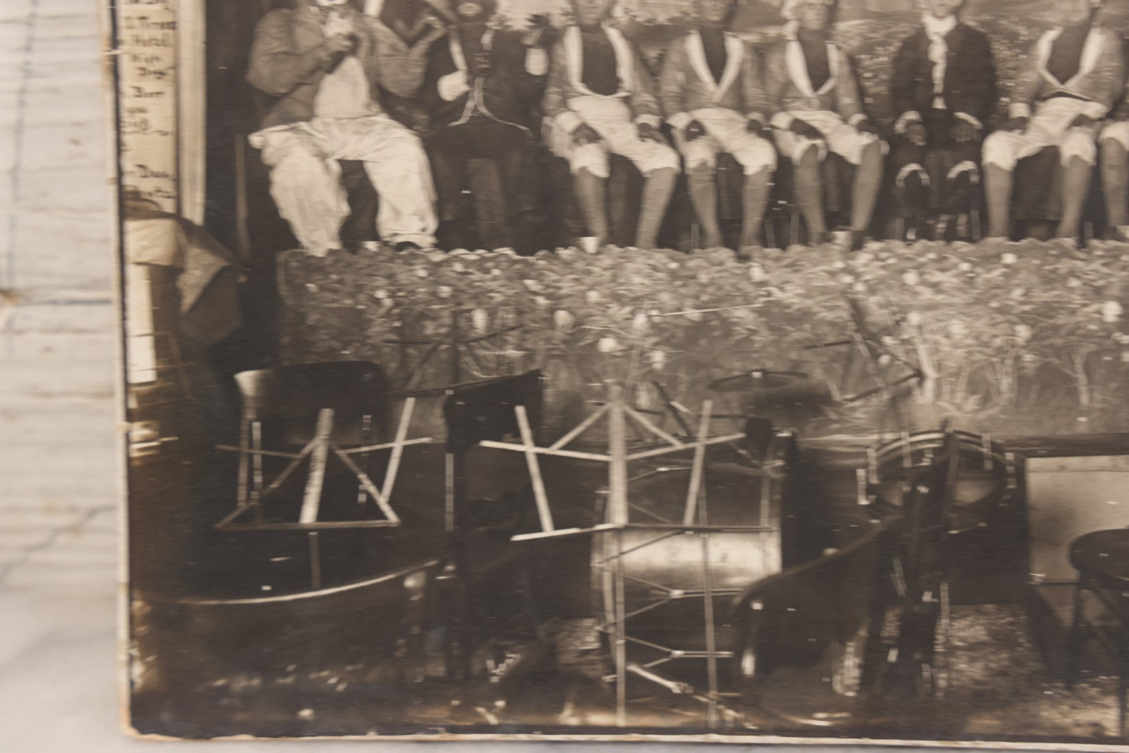 Lot 110 - Antique Boarded Photograph Of Stage Performers In Costume With Painted Backdrop And Drum Set, Music Stands In Foreground