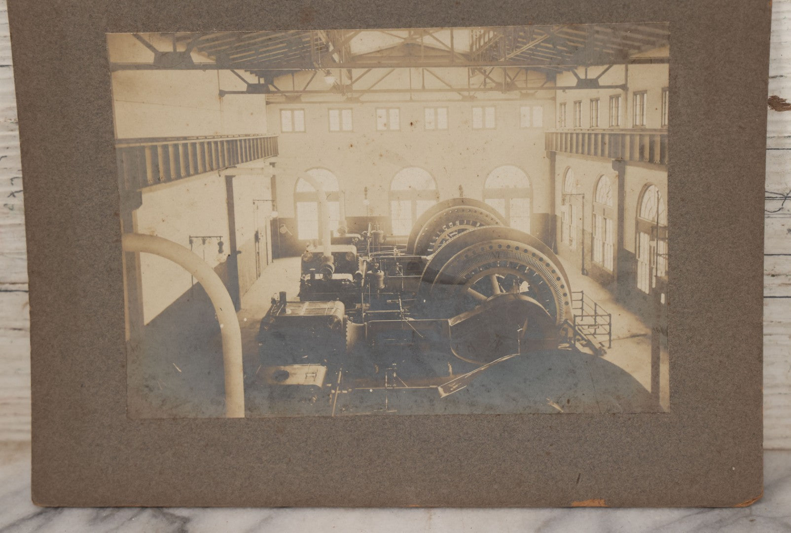 Lot 116 - Grouping Of Four Antique Photographs Of Massive Heavy Machinery In Room With Many Arched Windows