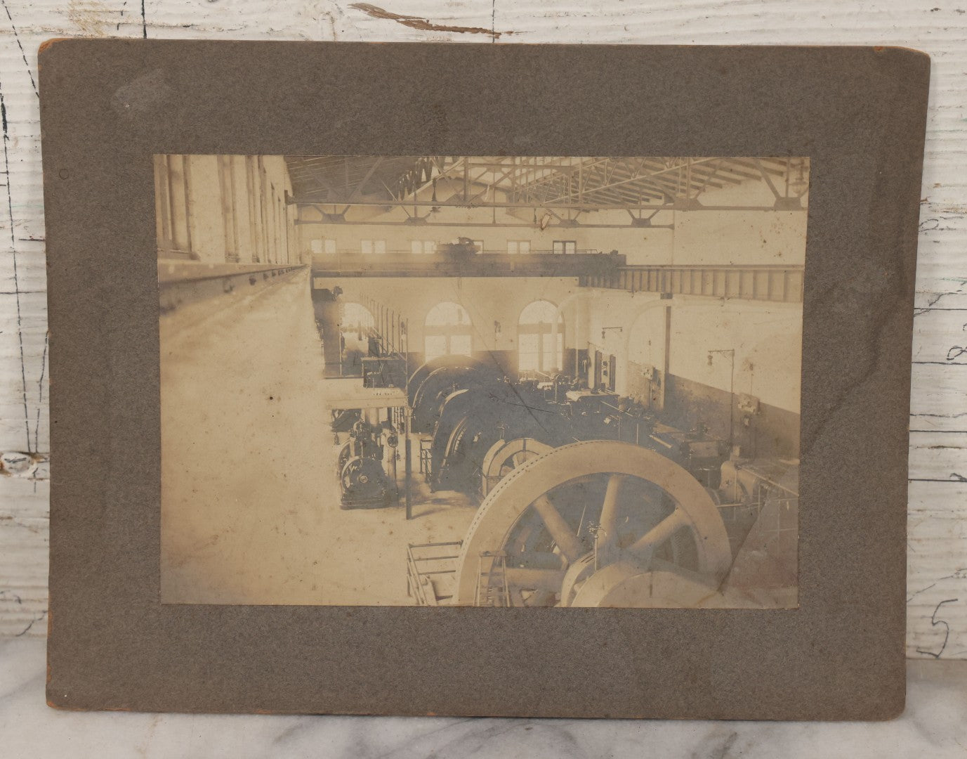 Lot 116 - Grouping Of Four Antique Photographs Of Massive Heavy Machinery In Room With Many Arched Windows