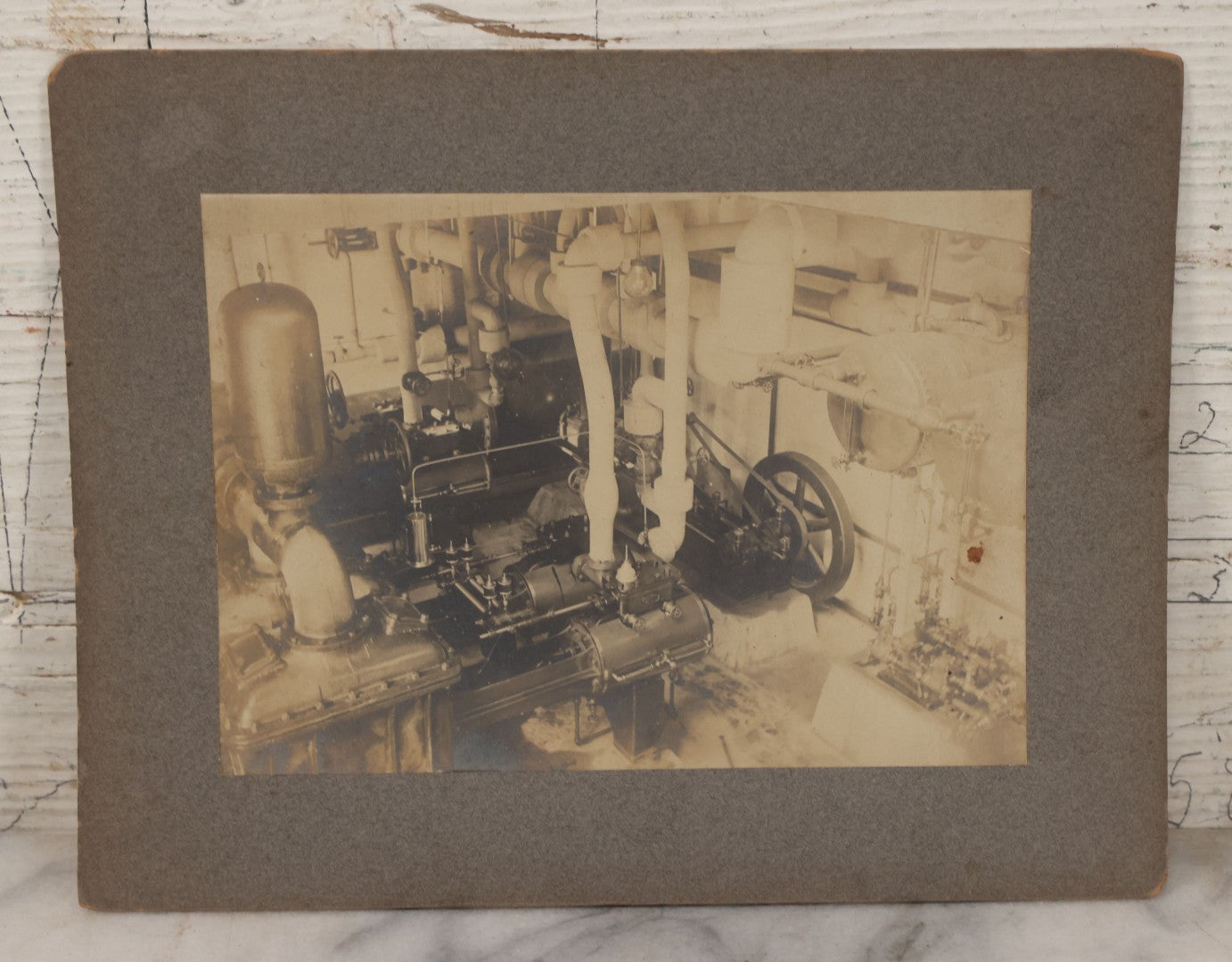 Lot 116 - Grouping Of Four Antique Photographs Of Massive Heavy Machinery In Room With Many Arched Windows
