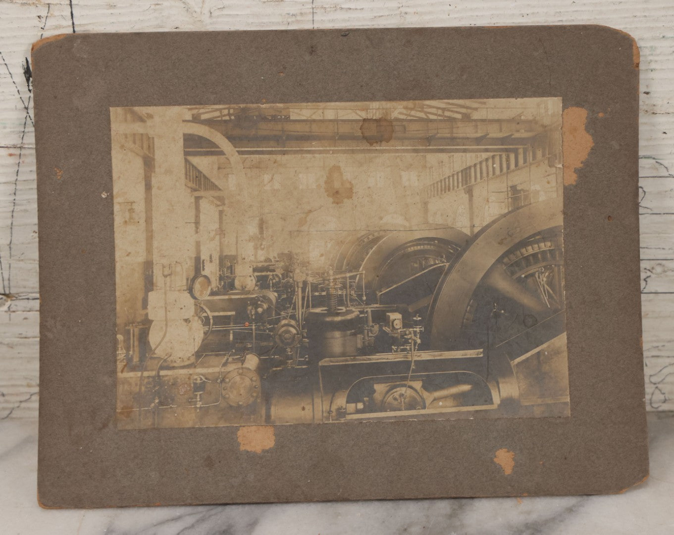 Lot 116 - Grouping Of Four Antique Photographs Of Massive Heavy Machinery In Room With Many Arched Windows