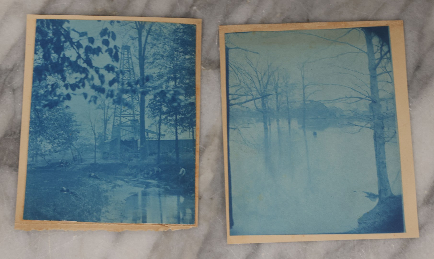 Lot 122 - Grouping Of Twelve Antique Paper Mounted Cyanotype Photographs Of Various Scenes Including Oil Well, Flooding, Canoeing, And Women Posing Outside Of Home