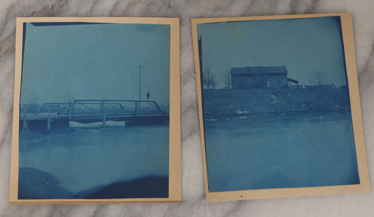 Lot 122 - Grouping Of Twelve Antique Paper Mounted Cyanotype Photographs Of Various Scenes Including Oil Well, Flooding, Canoeing, And Women Posing Outside Of Home