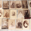 Lot 133 - Grouping Of 18 Antique Cabinet Card Photographs Including Pale Woman With Hand Muff, Friendly Man With Beard, Young Man With Bowler Cap And Swagger Stick, Boy Posing With Crane Table, And More