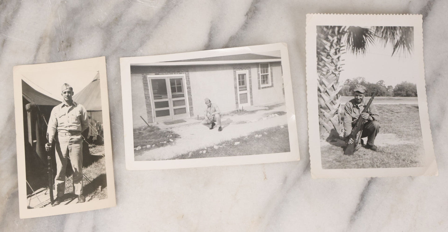 Lot 137 - Grouping Of 16 Post WWII Era Vintage Snapshot Photographs Of Soldiers Posing With Rifles, Goofing Off, And One Of Soldier Kissing His Lady