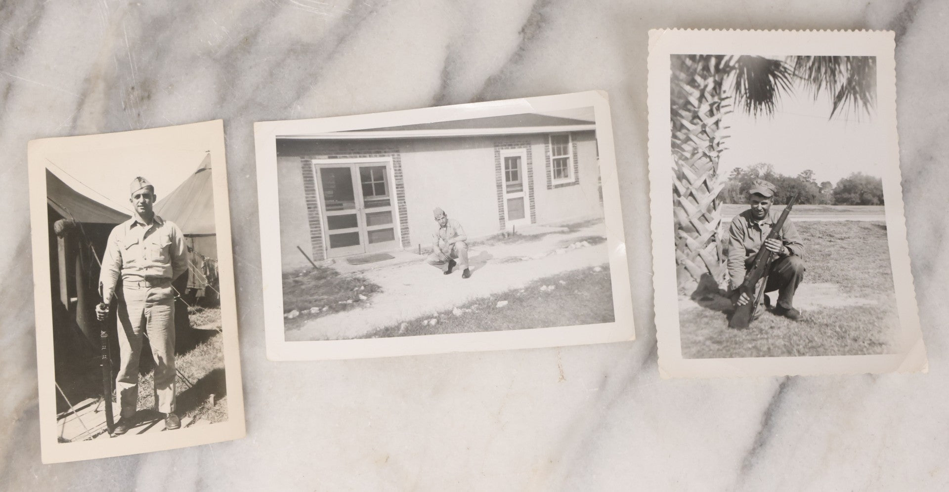 Lot 137 - Grouping Of 16 Post WWII Era Vintage Snapshot Photographs Of Soldiers Posing With Rifles, Goofing Off, And One Of Soldier Kissing His Lady