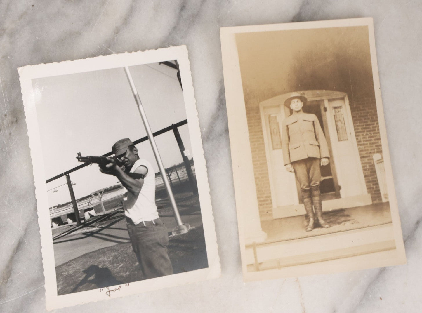 Lot 137 - Grouping Of 16 Post WWII Era Vintage Snapshot Photographs Of Soldiers Posing With Rifles, Goofing Off, And One Of Soldier Kissing His Lady