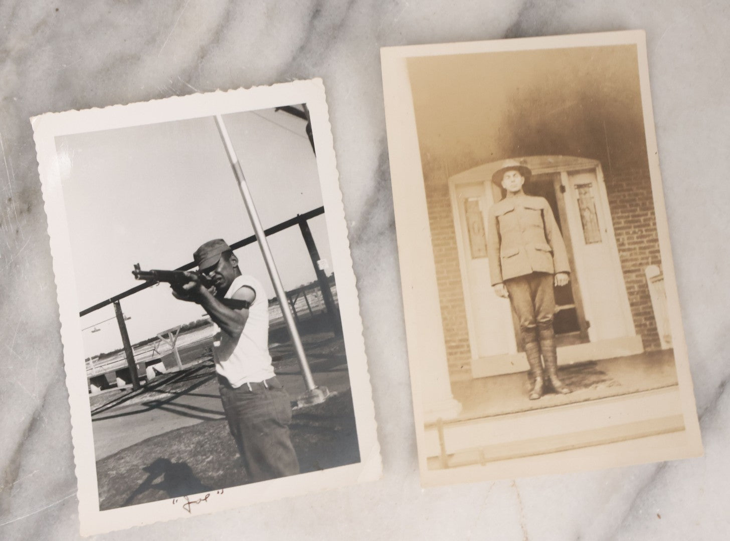 Lot 137 - Grouping Of 16 Post WWII Era Vintage Snapshot Photographs Of Soldiers Posing With Rifles, Goofing Off, And One Of Soldier Kissing His Lady
