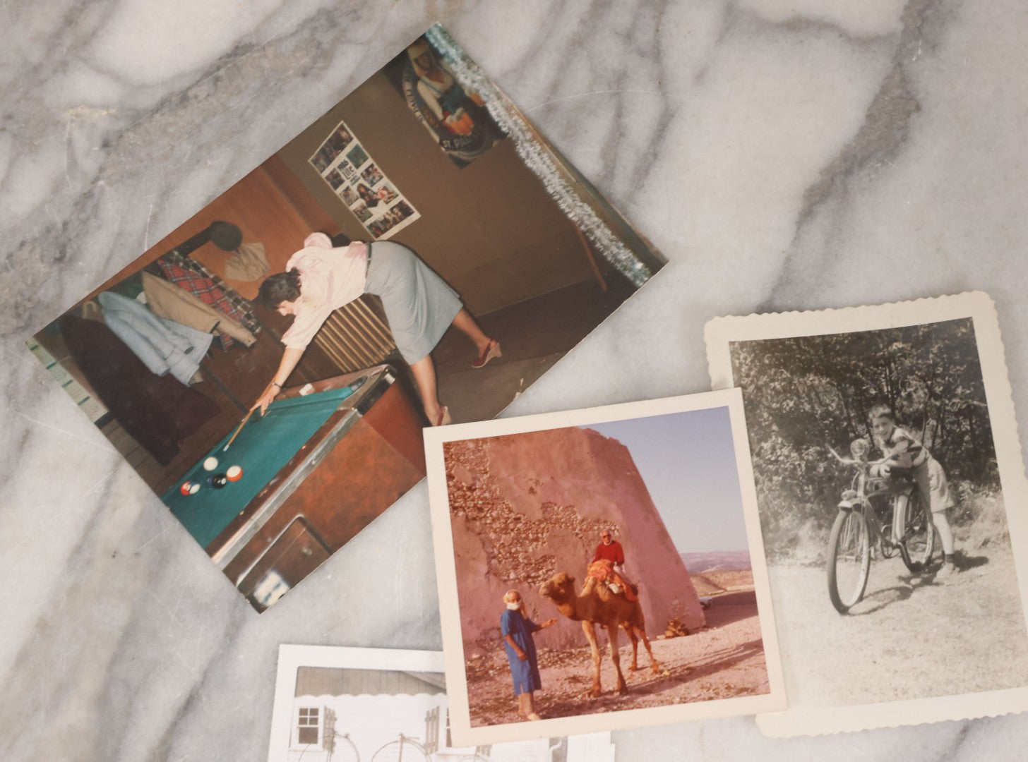 Lot 139 - Grouping Of 25 Vintage Snapshot Vernacular Photographs Including Girls On Motorcycle With Sidecar, Men In Tophats Posing With Bicycles, Man Flipping Off Camera, And More