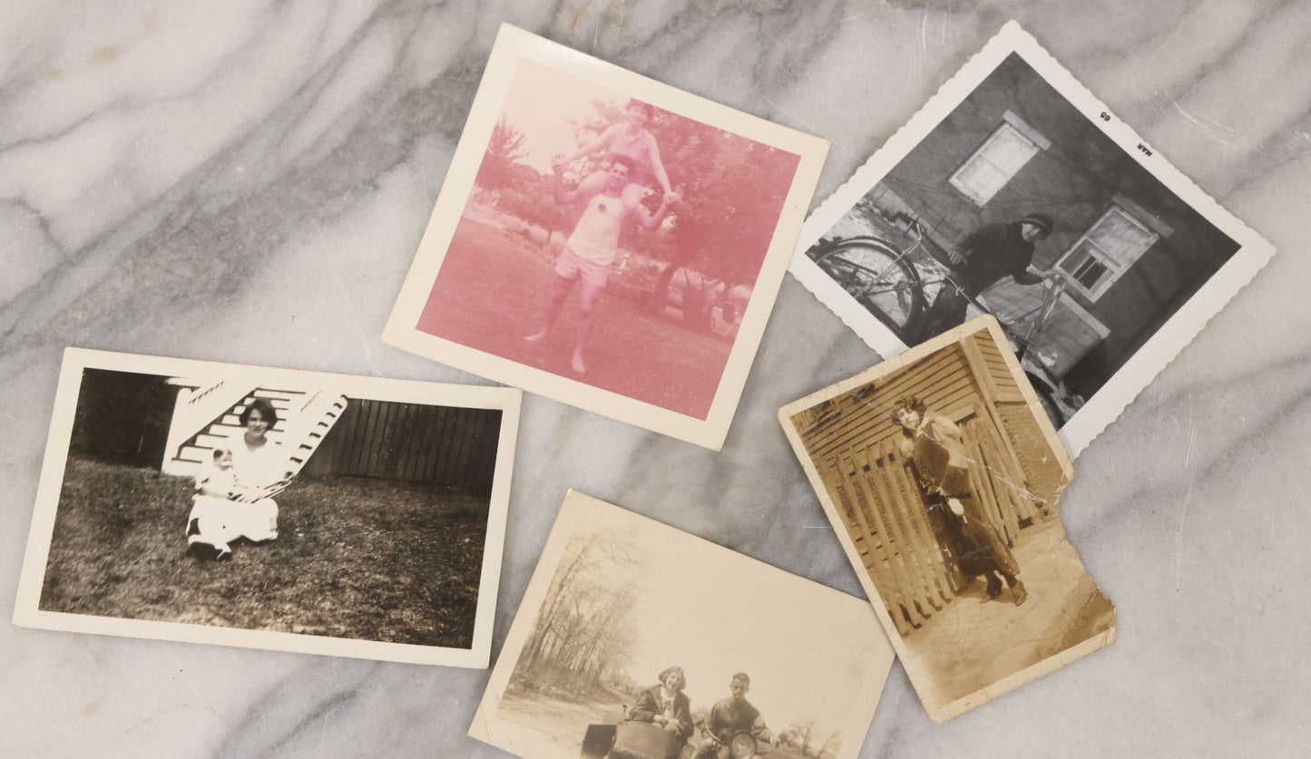 Lot 139 - Grouping Of 25 Vintage Snapshot Vernacular Photographs Including Girls On Motorcycle With Sidecar, Men In Tophats Posing With Bicycles, Man Flipping Off Camera, And More