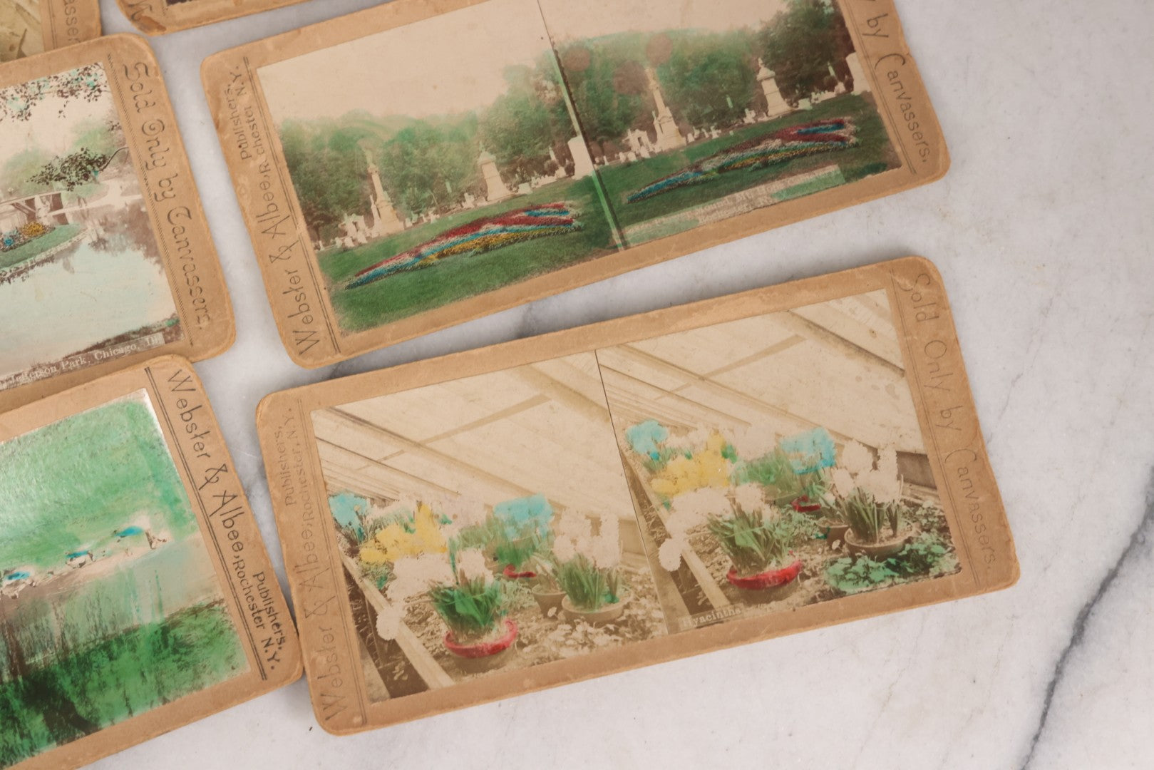 Lot 140 - Grouping Of 12 Antique Stereocards Including Many Handcolored Examples Of Parks And Flower Arrangements, Others