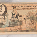 Lot 163 - Antique Lithographed Trade Card For The Light-Running New Home Sewing Machine By Johnson, Clark & Co., Orange, Massachusetts, With Babies Riding High Wheel Bicycles