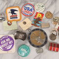 Lot 170 - Grouping Of 10+ Vintage Smalls With Pins, Badges, And More, Including Train Money Clip, Boston Maine Railroad 1930 Pin, St. Christopher Protection Medallion, Esso Tiger Keychain, National Sportsman Fob, And More
