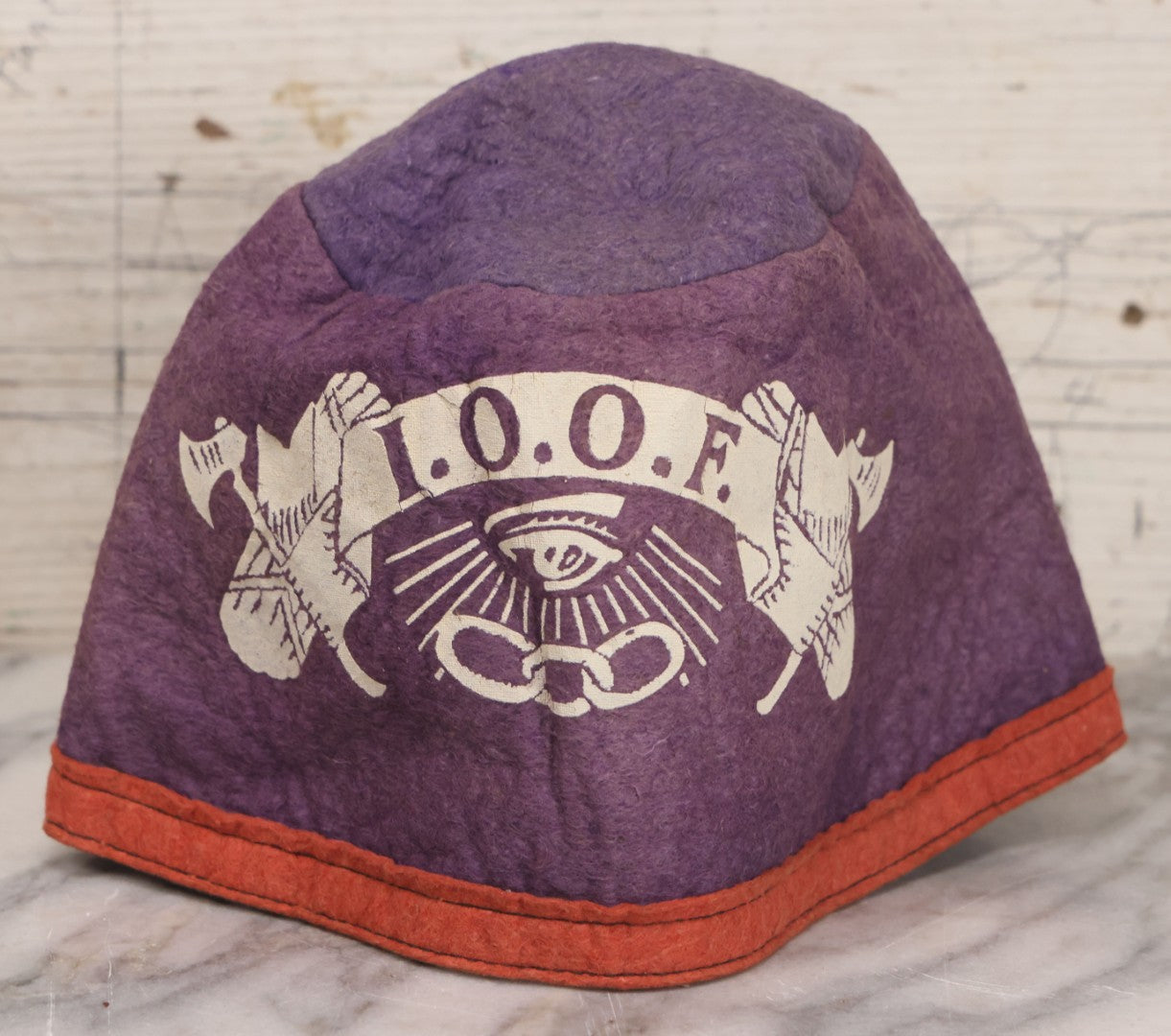 Lot 171 - Vintage Purple Felt Odd Fellows I.O.O.F. Cap Hat With All-Seeing Eye, Three Links, Axes, And Banner