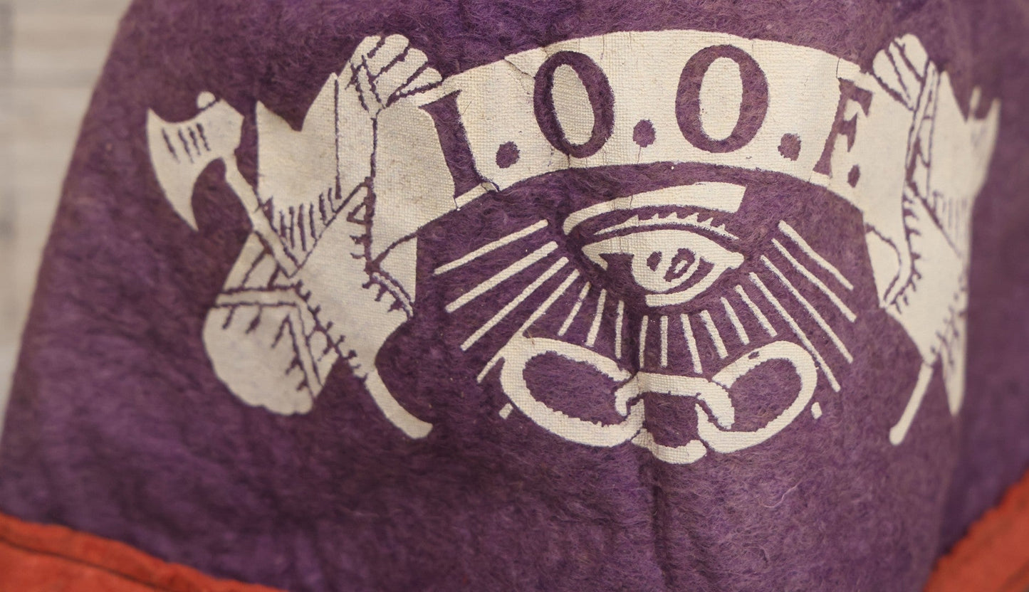 Lot 171 - Vintage Purple Felt Odd Fellows I.O.O.F. Cap Hat With All-Seeing Eye, Three Links, Axes, And Banner