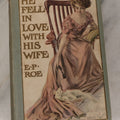 Lot 110 - "He Fell In Love With His Wife" Antique Romance Novel By Edward P. Roe, With Cover Art Of Woman Playing With Fluffy White Cat, Illustrated By Z.P. Nikolaki, Grosset & Dunlap, Publishers, New York, Copyright 1911, By Dodd, Mead & Co.