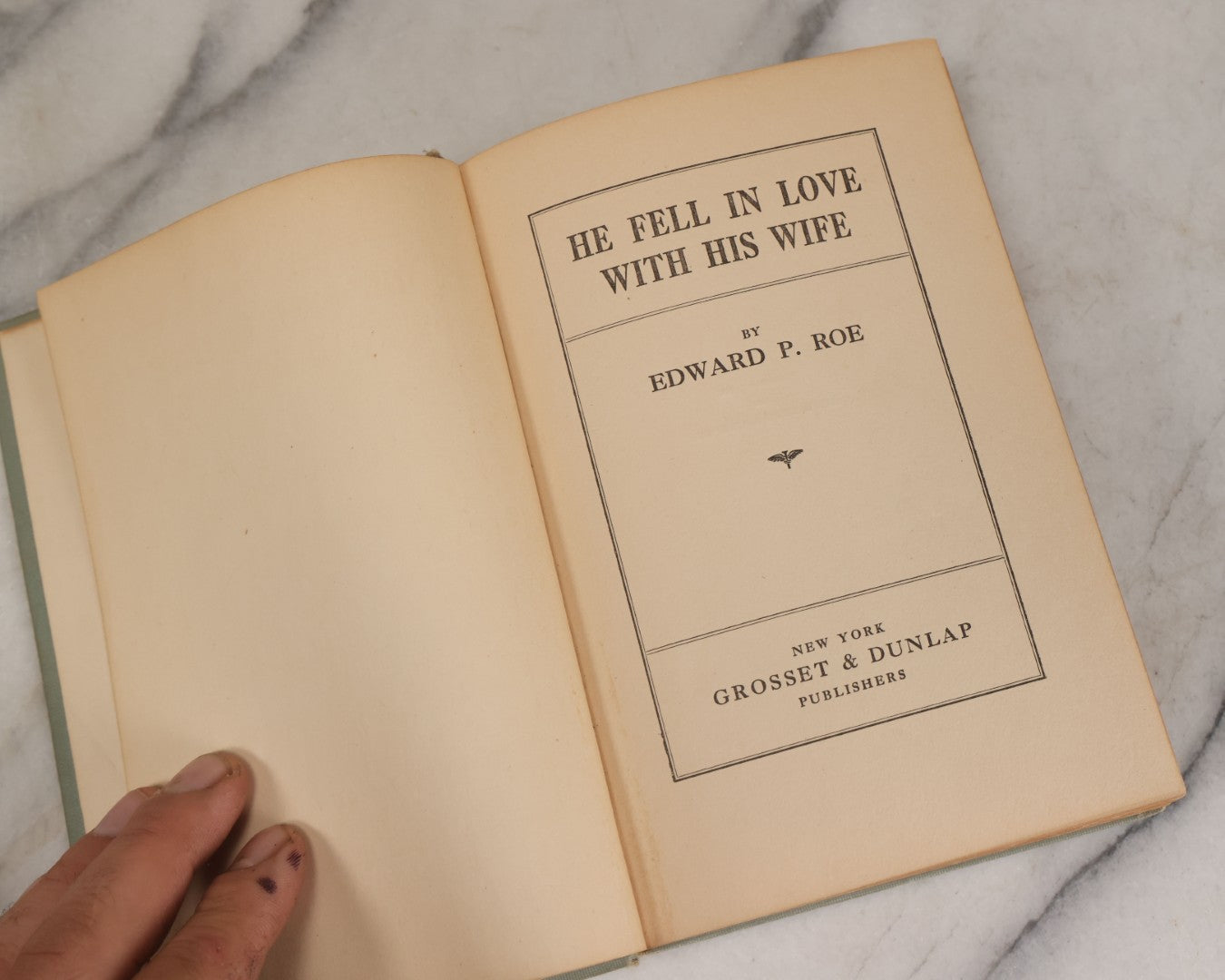 Lot 110 - "He Fell In Love With His Wife" Antique Romance Novel By Edward P. Roe, With Cover Art Of Woman Playing With Fluffy White Cat, Illustrated By Z.P. Nikolaki, Grosset & Dunlap, Publishers, New York, Copyright 1911, By Dodd, Mead & Co.