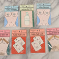 Lot 047 - Grouping Of Seven Vintage "International Gags" Offensive Stereotype Novelty Jokes, Including Italian Chestnuts, French Bikini Set, And Polish Flashcards, Wade Enterprises, East Granby, Connecticut