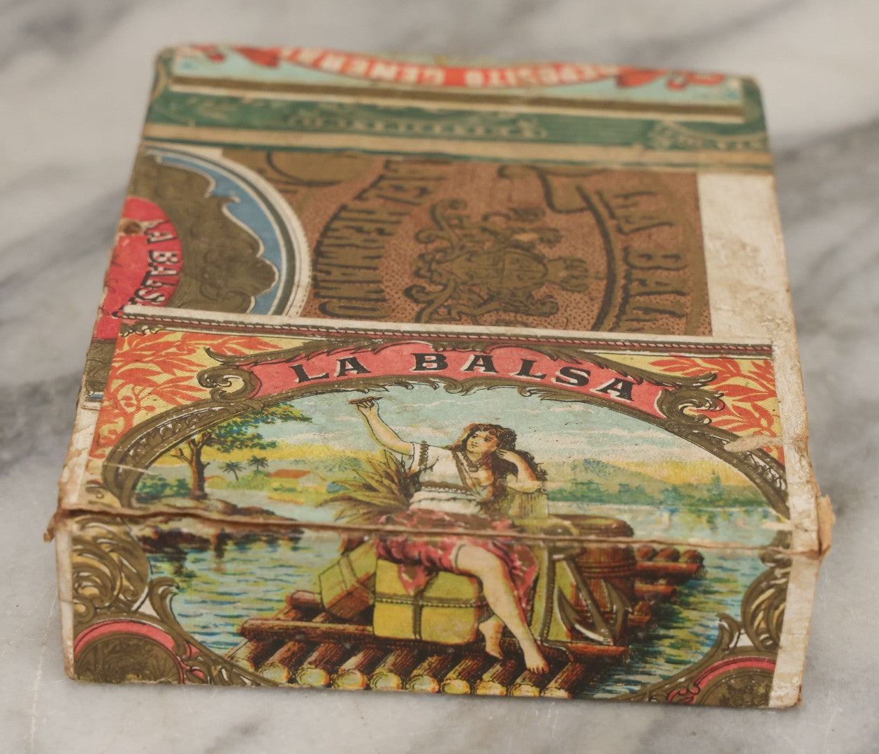 Lot 116 - Antique Wooden Cigar Box For "La Balsa" Cigars, Manufactured By Peláez Hermanos Sociedad En Comandita, Veracruz And Puebla, Mexico., With Lithographed Interior And Exterior Labels With Pretty Woman Smoking On Raft Graphics