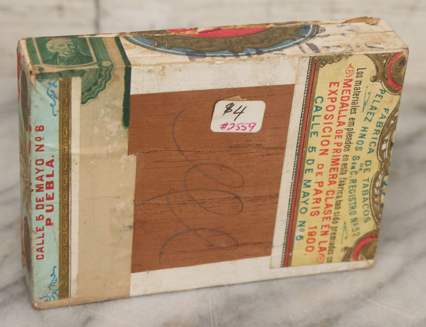 Lot 116 - Antique Wooden Cigar Box For "La Balsa" Cigars, Manufactured By Peláez Hermanos Sociedad En Comandita, Veracruz And Puebla, Mexico., With Lithographed Interior And Exterior Labels With Pretty Woman Smoking On Raft Graphics