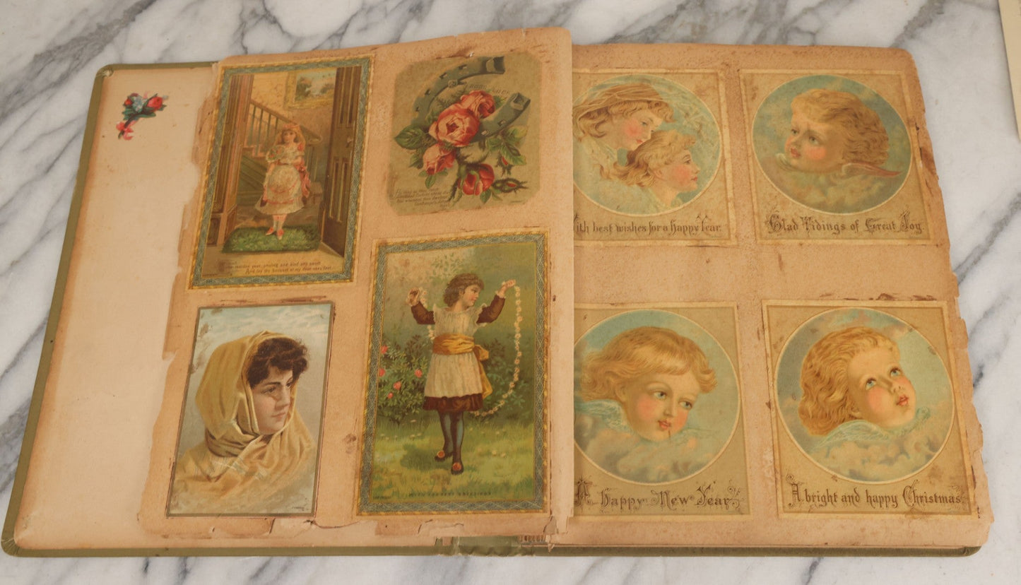 Lot 118 - Antique Victorian Scrapbook Album Green Cover, Silver Daisy Motif, With Many Lithographed Trade Cards, Holiday Cards, And Die Cuts, 90+ Pieces, Including Several Loose Cards