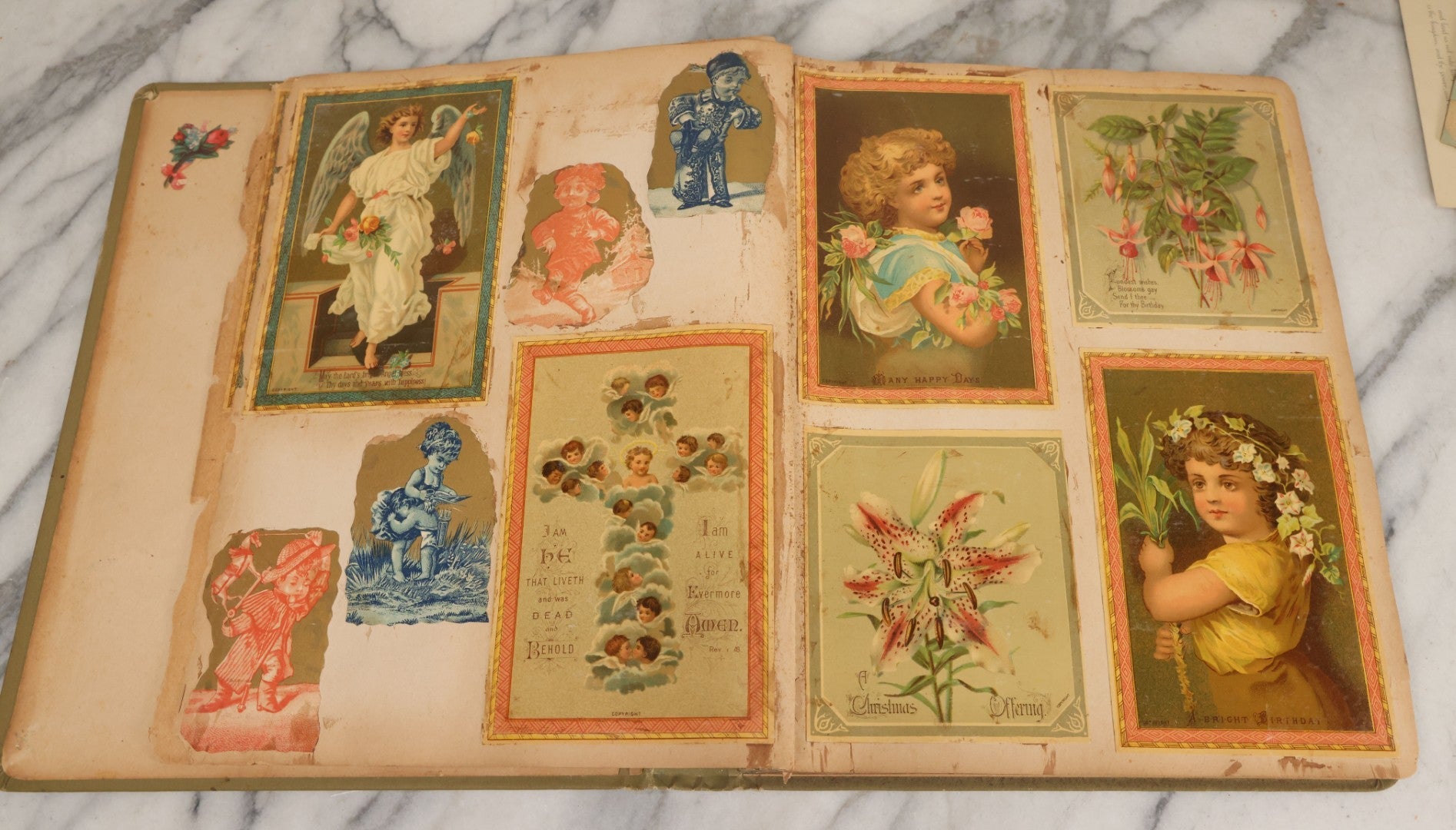 Lot 118 - Antique Victorian Scrapbook Album Green Cover, Silver Daisy Motif, With Many Lithographed Trade Cards, Holiday Cards, And Die Cuts, 90+ Pieces, Including Several Loose Cards
