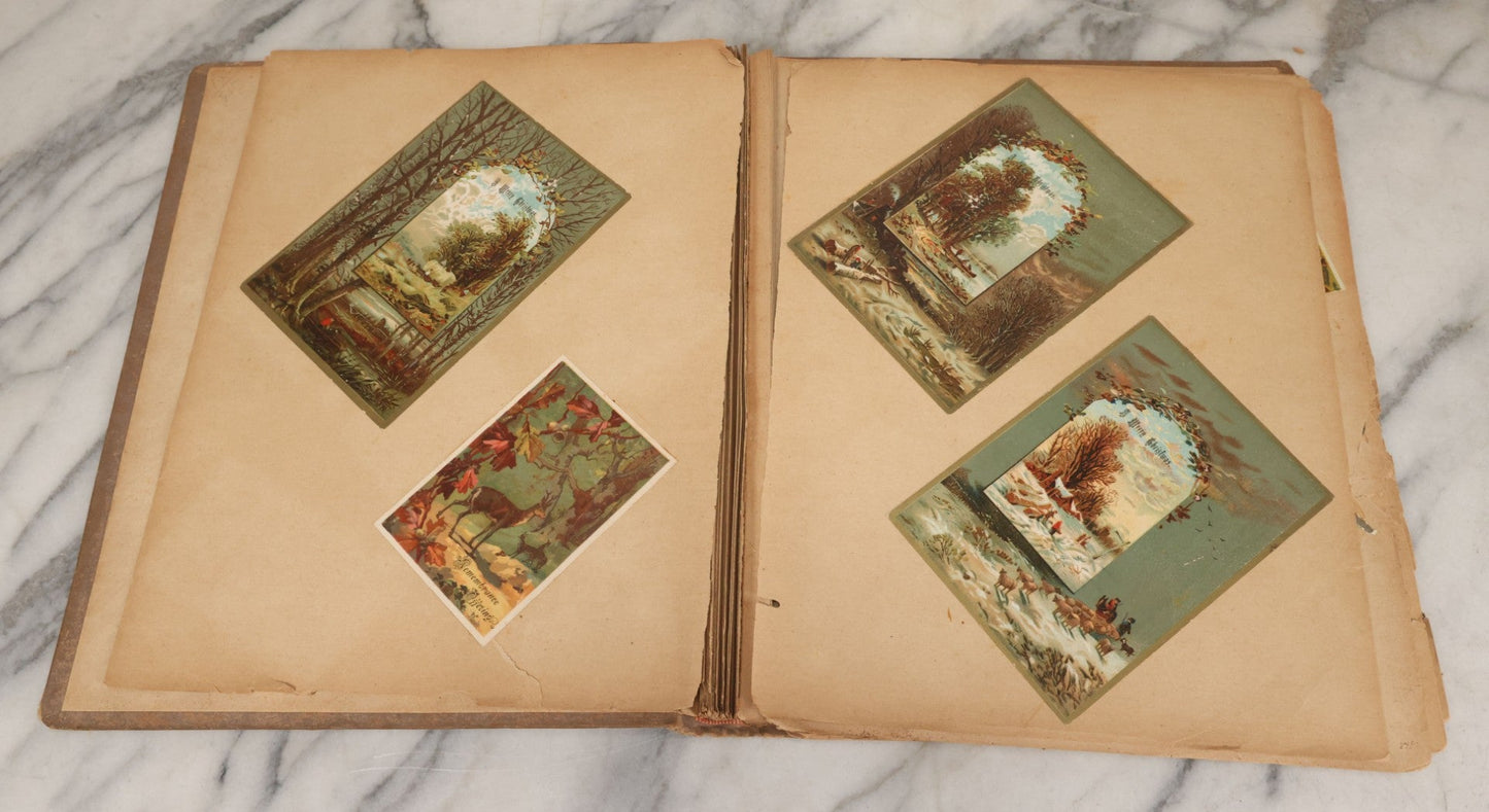 Lot 119 - Antique Victorian Scrapbook Album Cover With Playing Cards And Dogs Graphics, With Many Lithographed Trade Cards, Holiday Cards, And Die Cuts, 100+ Pieces