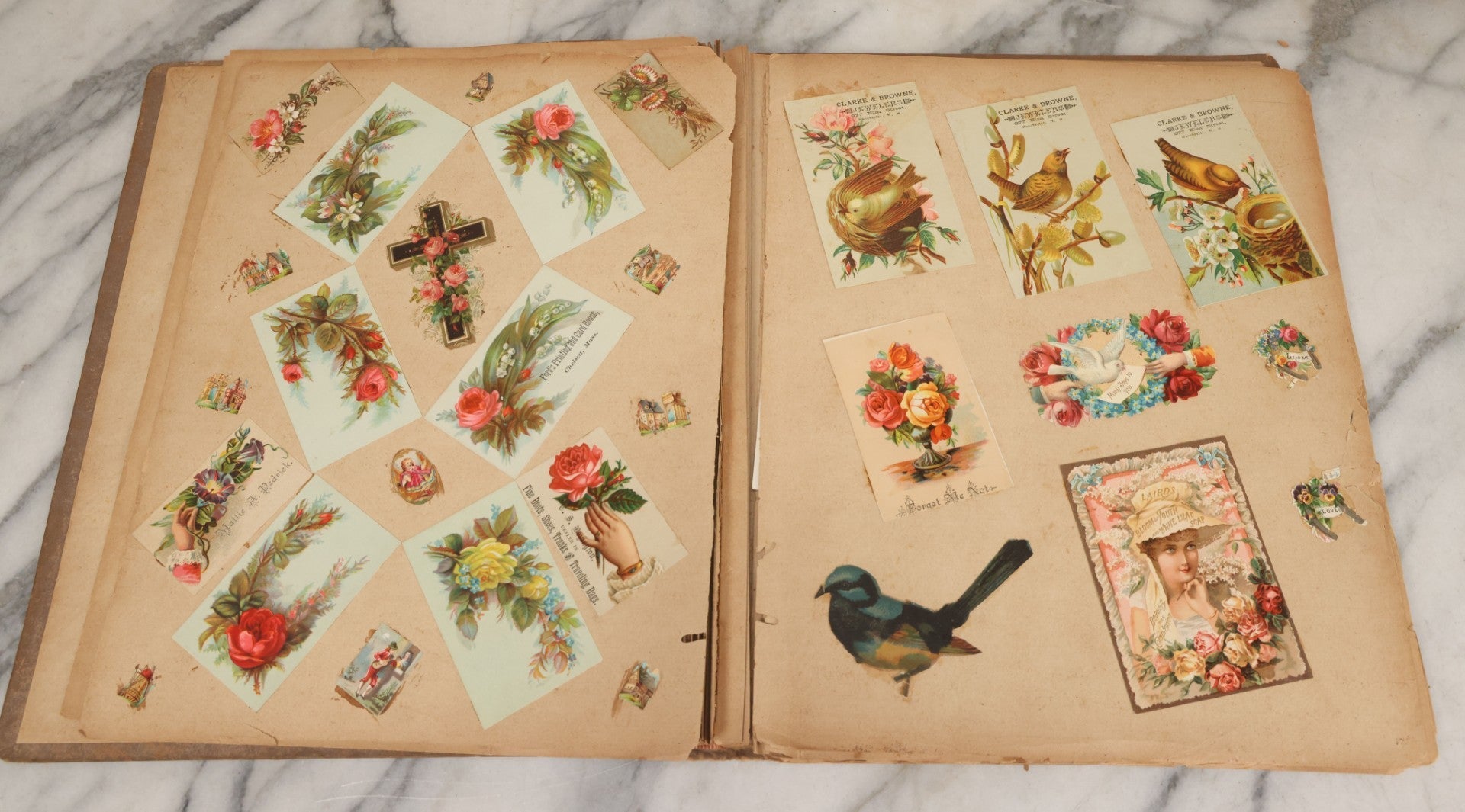 Lot 119 - Antique Victorian Scrapbook Album Cover With Playing Cards And Dogs Graphics, With Many Lithographed Trade Cards, Holiday Cards, And Die Cuts, 100+ Pieces