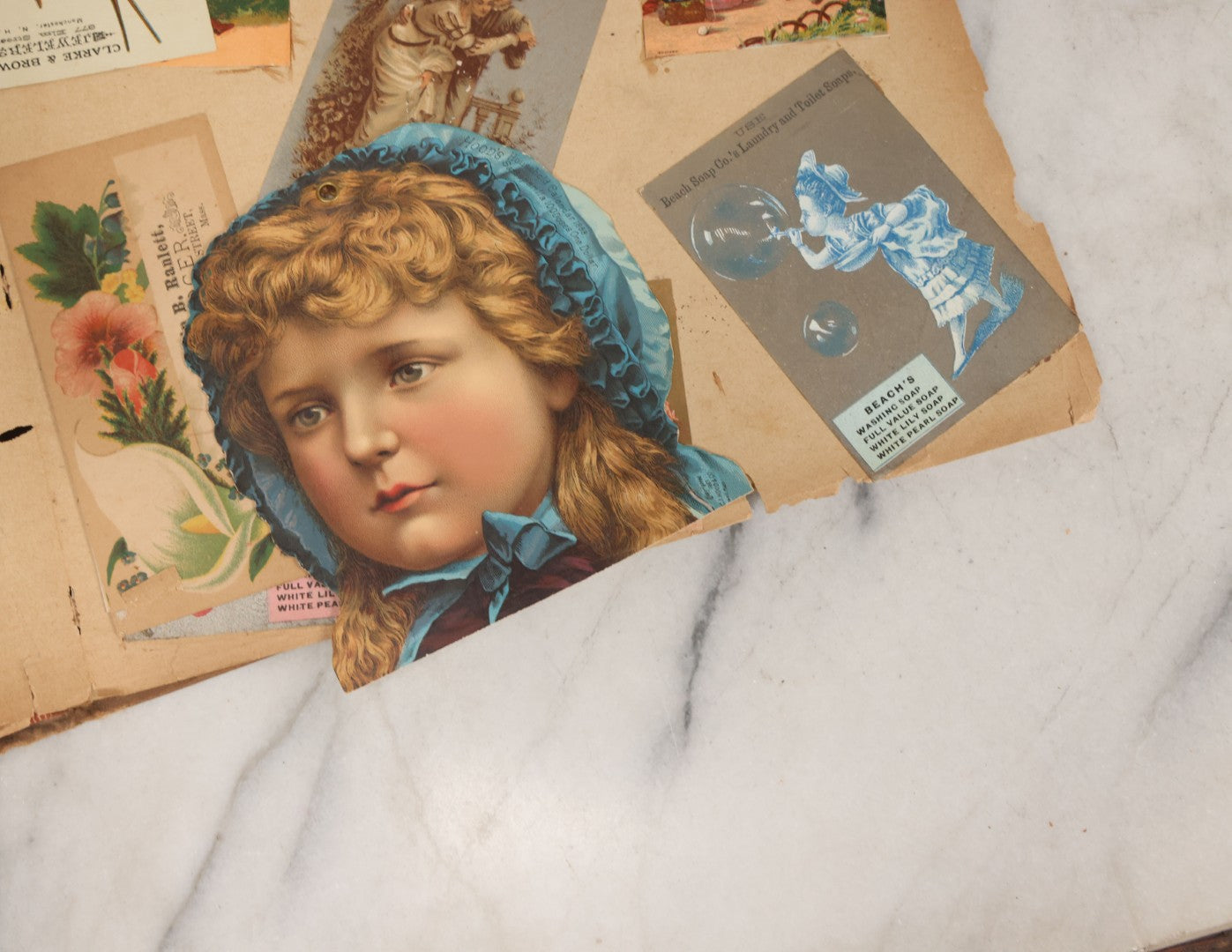 Lot 119 - Antique Victorian Scrapbook Album Cover With Playing Cards And Dogs Graphics, With Many Lithographed Trade Cards, Holiday Cards, And Die Cuts, 100+ Pieces