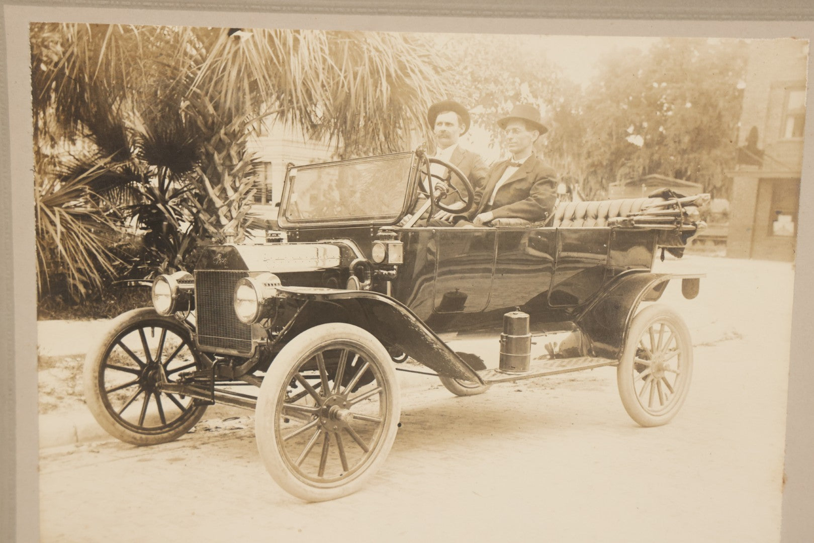 Lot 126 - Antique Boarded Photograph Of Two Gentlemen In Fedoras Seated In Early Automobile, Likely Circa 1916 Ford Model T